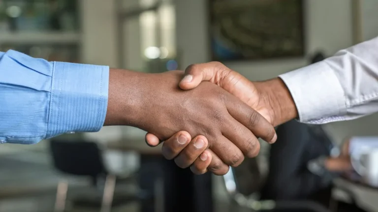 financial strategies handshake deal sealed
