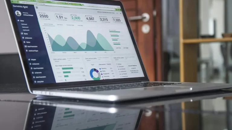 business growth analytics dashboard on laptop